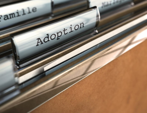Image of files with the words of Adoptions
