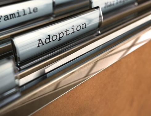 Adoptions Image of files with the words of Adoptions